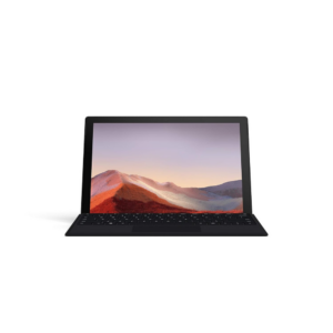 Modern slim laptop with open display showing minimal landscape wallpaper.