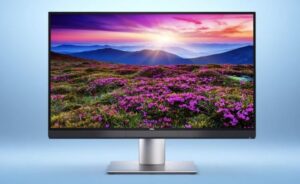 High-performance ASUS gaming laptop with RGB backlit keyboard and illuminated light bar on a wooden table