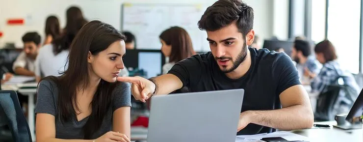 Two colleagues working together laptop office 605022 220657