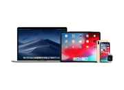 All-in-one desktop computer with widescreen monitor, wireless keyboard, and mouse on a white background